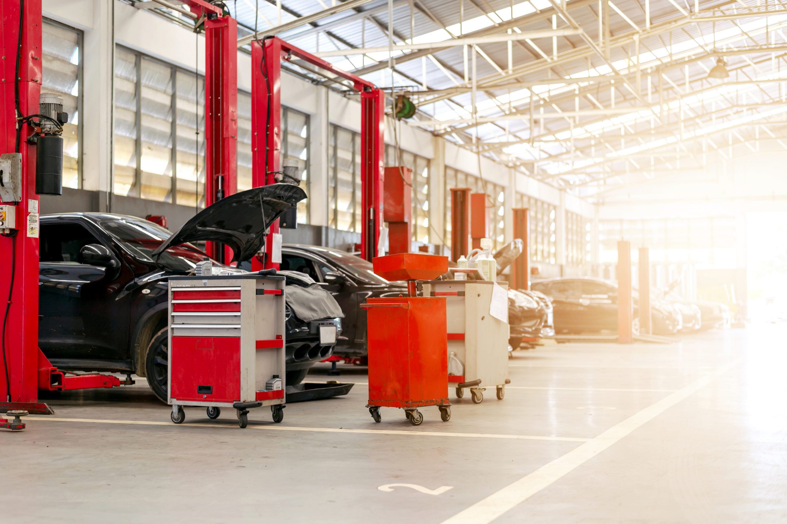 car repair station with softfocus and over light in the background Lane & Associates