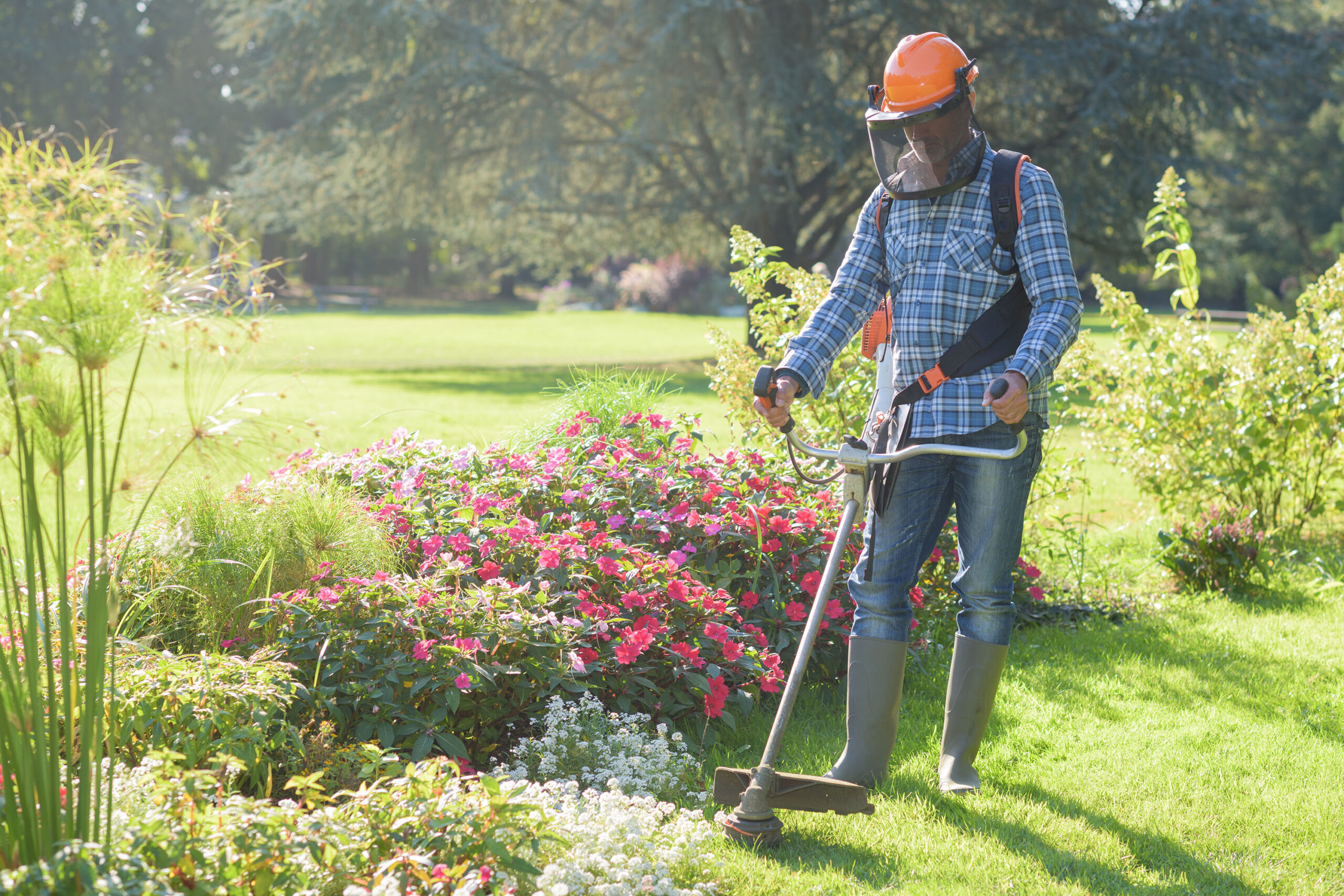 Man doing landscaping. Weed Out Risk This Spring with General Liability Insurance, Branch Out for Lawn Care and Landscaping Risks